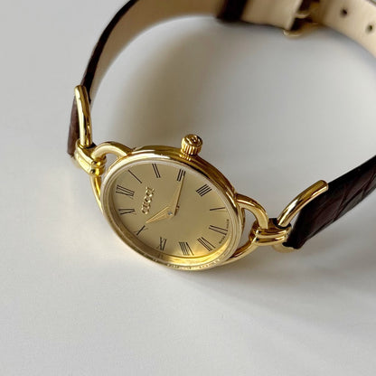 Gucci 1990s Gold Round Dial Horsebit Gold Plated Watch