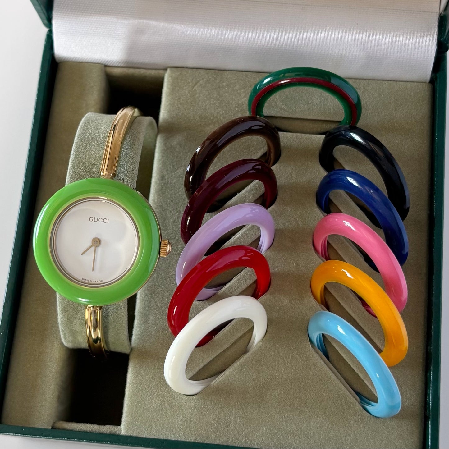 Gucci 1990s Interchangeable Bezel Gold Plated Bangle Watch with 12 bezels, case (Small)