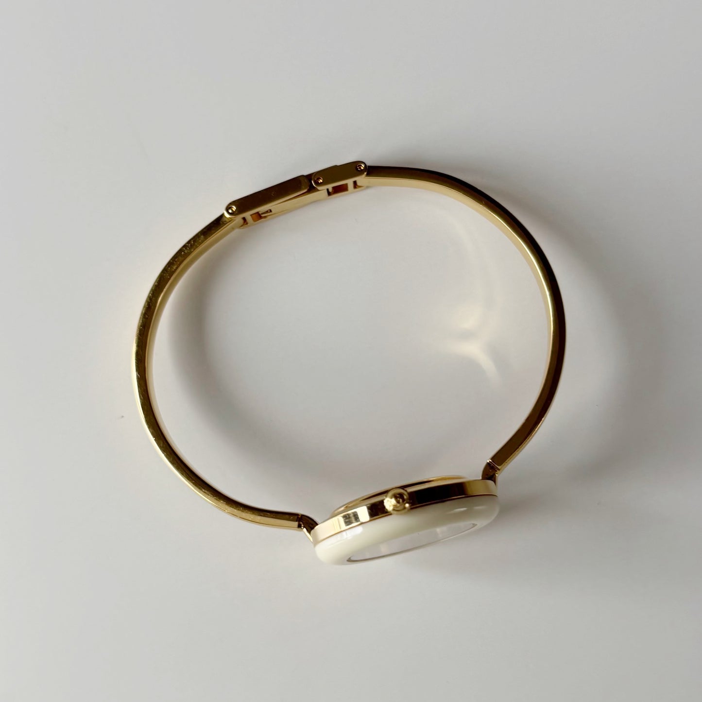 Gucci 1990s Interchangeable Bezel Gold Plated Bangle Watch with 12 bezels, case