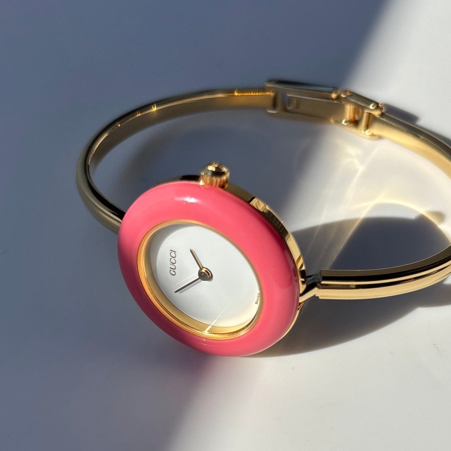 Gucci 1990s Interchangeable Bezel Gold Plated Bangle Watch with 12 bezels, case