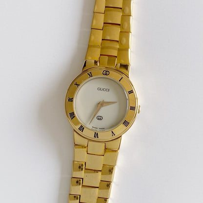 Gucci 1990s Gold Plated Round Watch