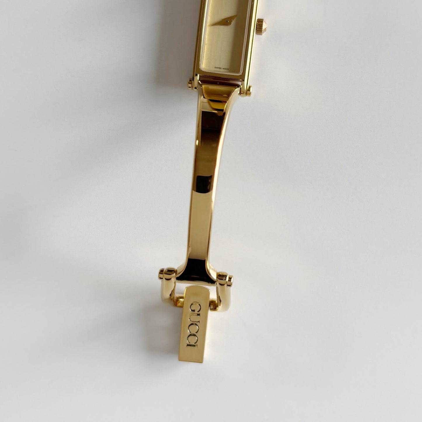 Gucci 1990s Gold Dial Rectangular Gold Plated Bangle Watch