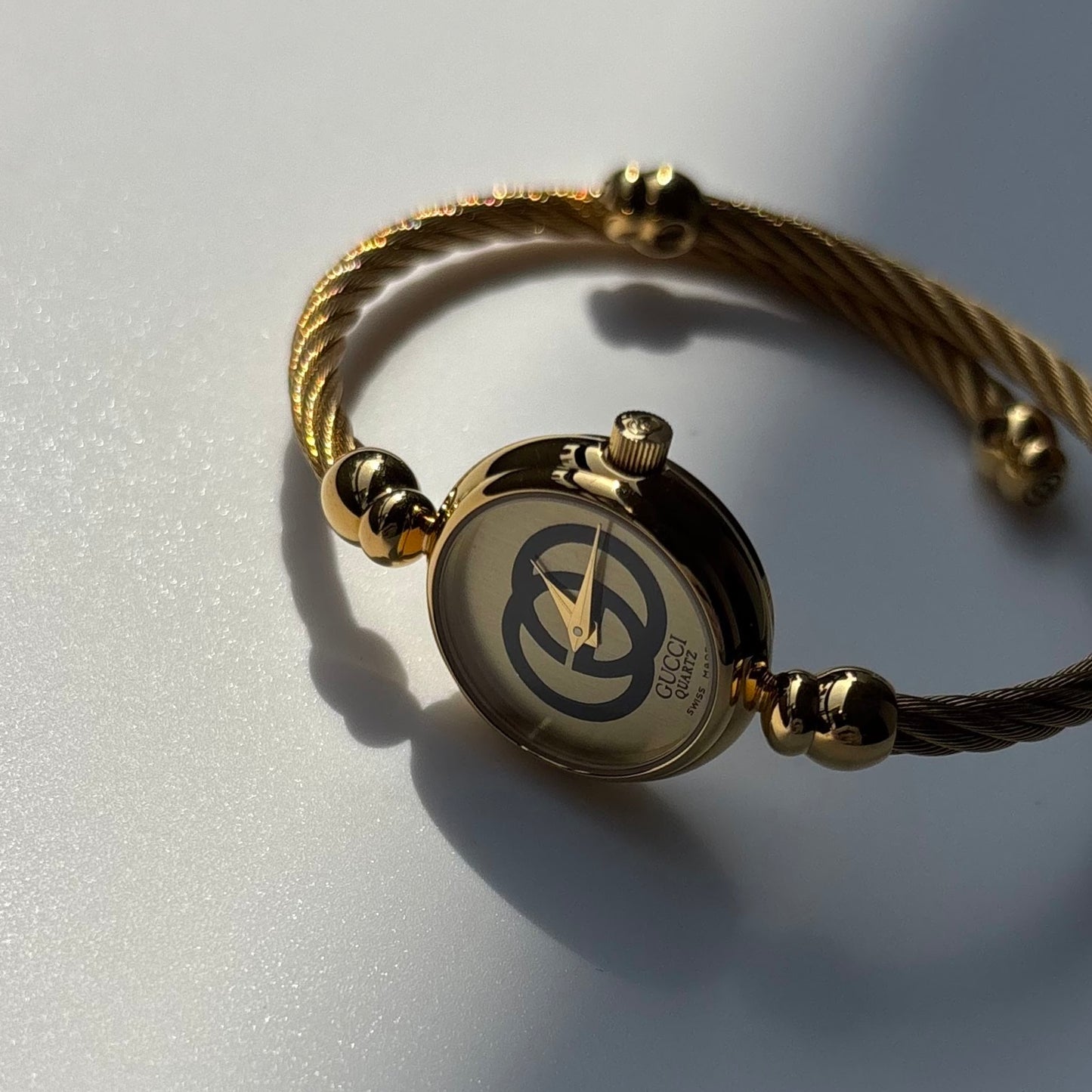 Gucci 1980s Round Dial Cable Band Bangle Watch