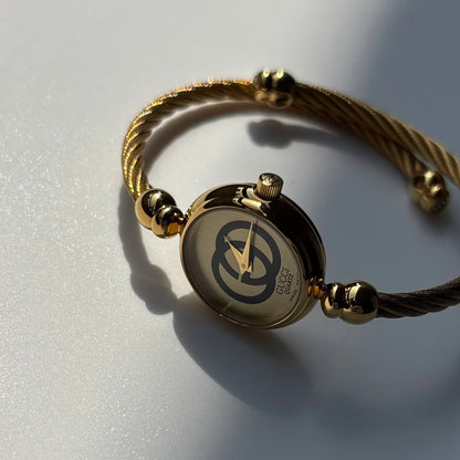 Gucci 1980s Round Dial Cable Band Bangle Watch