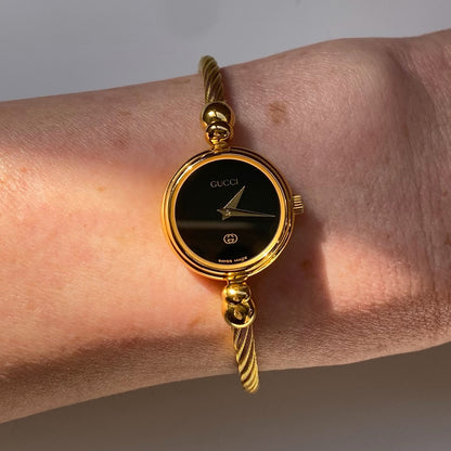 Gucci 1990s Black Dial Gold Plated Cable Bangle Watch