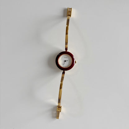 Gucci 1990s Interchangeable Bezel Gold Plated Bangle Watch with 12 bezels, case