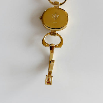 Gucci 1990s Oval Black Dial Gold Plated Bangle Watch (Small)