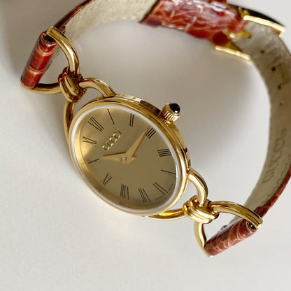 Gucci 1990s Gold Plated Round Dial Horsebit Watch