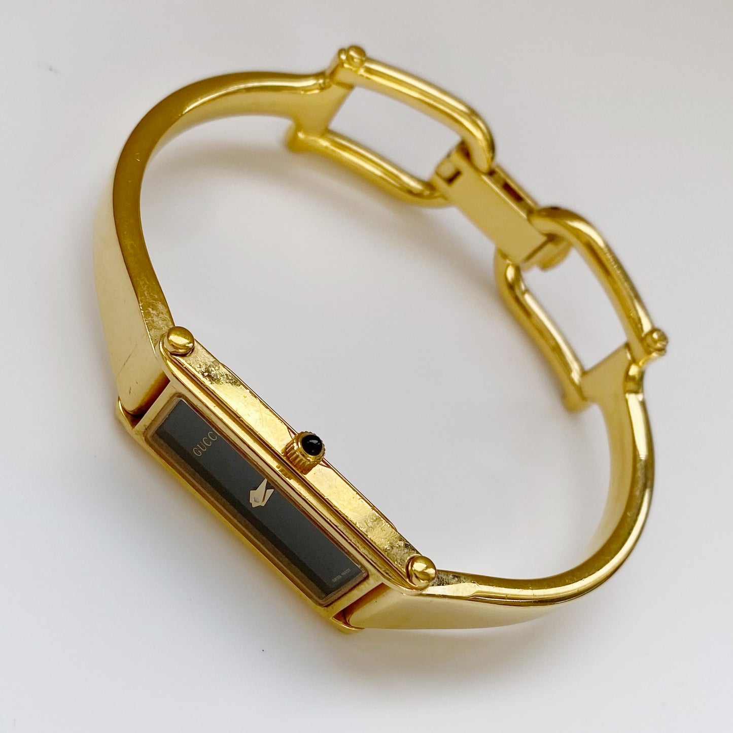 Gucci 1990s Black Dial Gold Plated Rectangular Bangle Watch