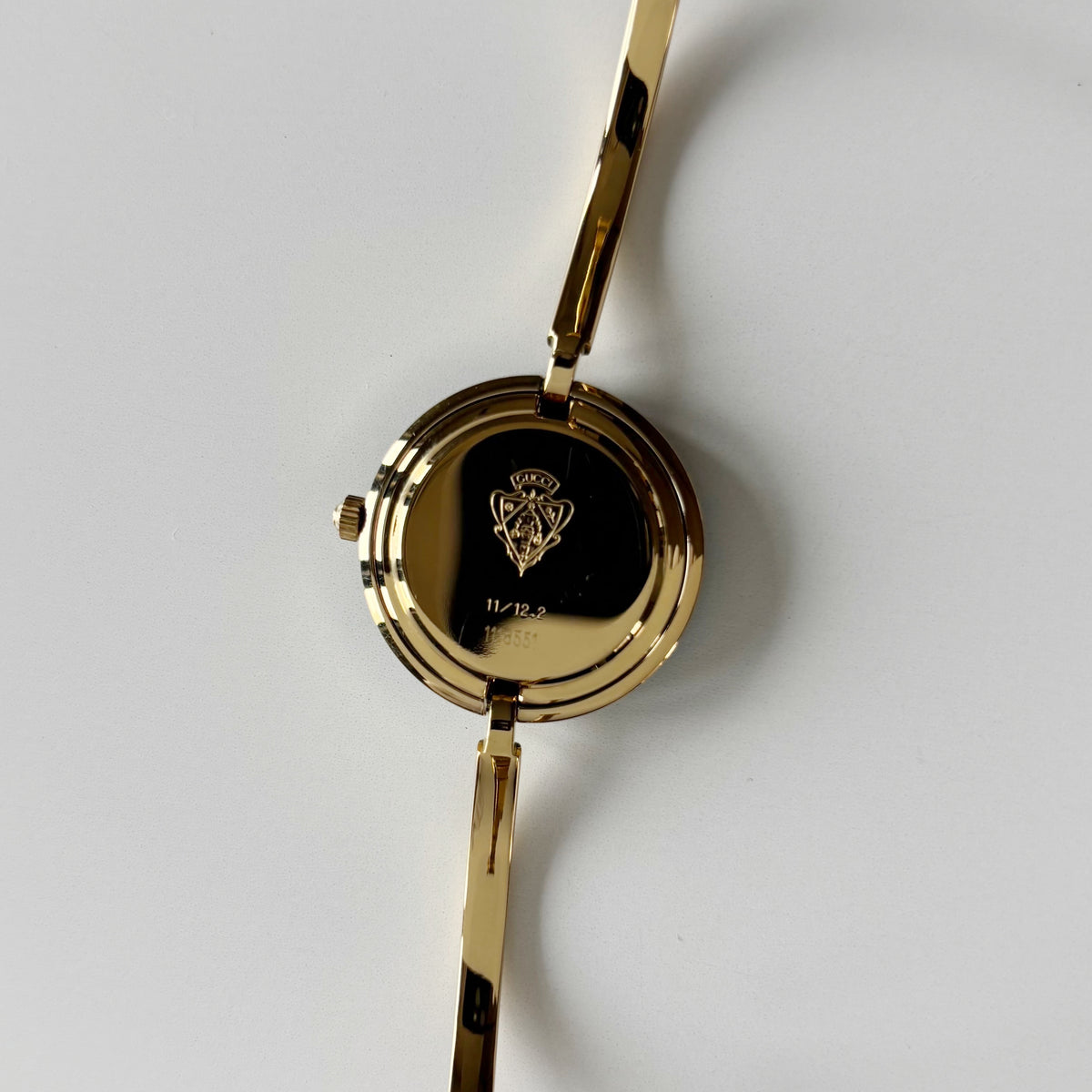 Gucci 1990s Interchangeable Bezel Gold Plated Bangle Watch with 12 bezels, case