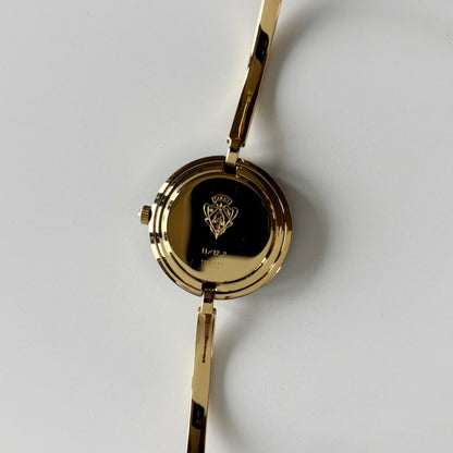 Gucci 1990s Interchangeable Bezel Gold Plated Bangle Watch with 12 bezels, case