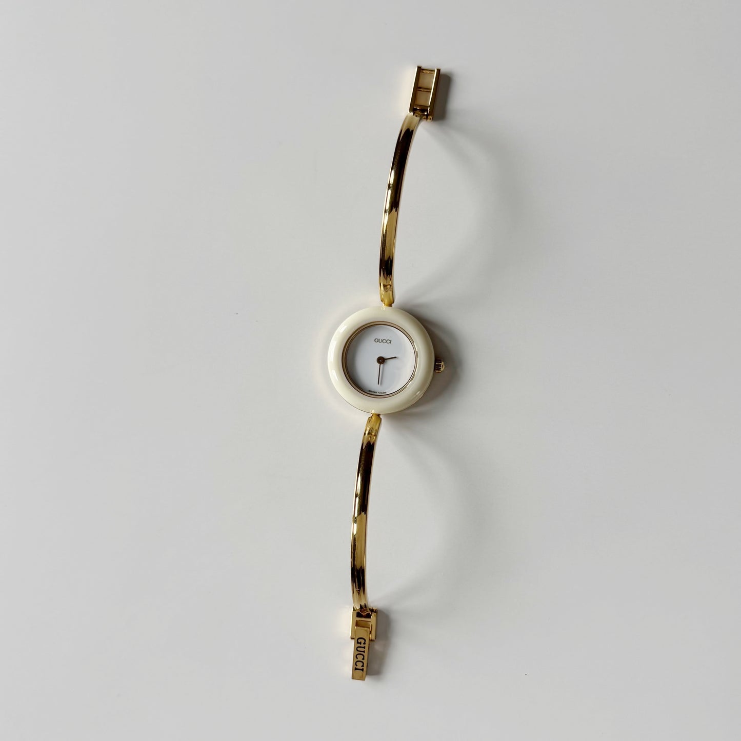 Gucci 1990s Interchangeable Bezel Gold Plated Bangle Watch with 12 bezels, case
