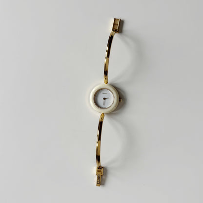 Gucci 1990s Interchangeable Bezel Gold Plated Bangle Watch with 12 bezels, case