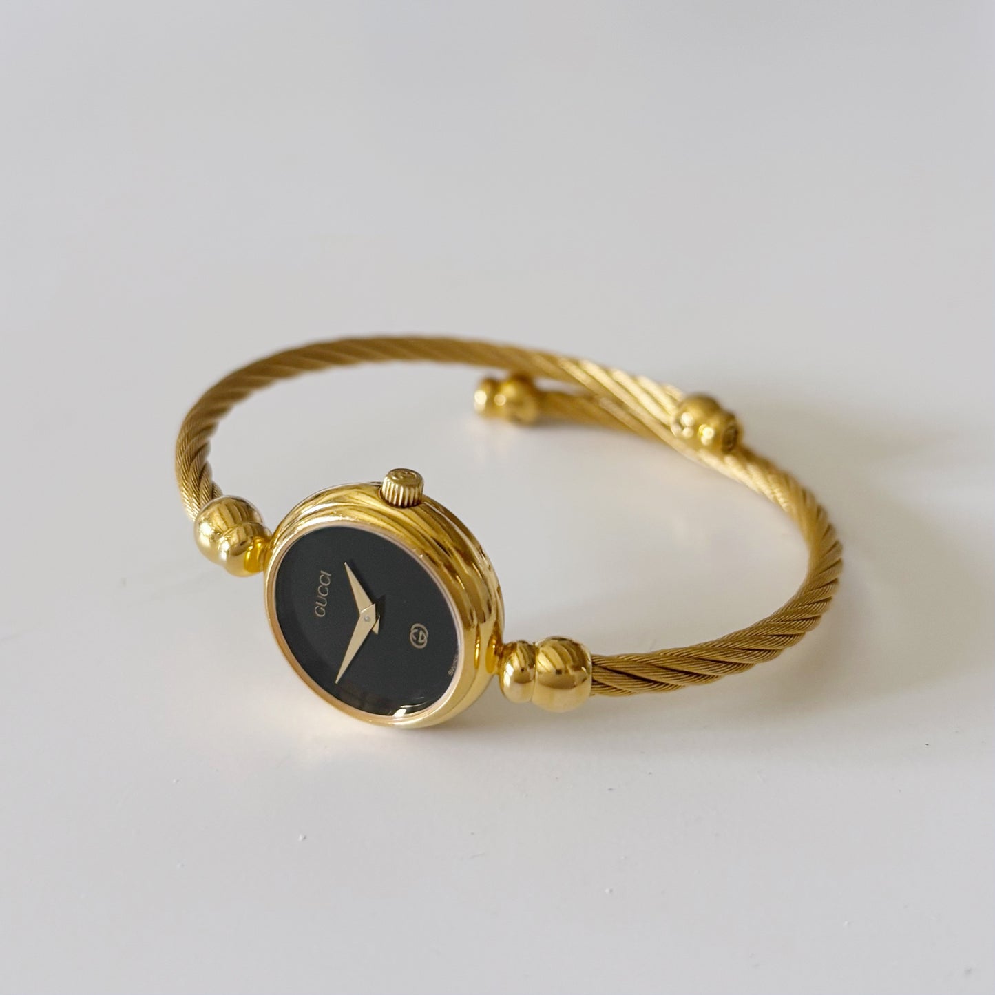 Gucci 1990s Black Dial Gold Plated Bangle Watch