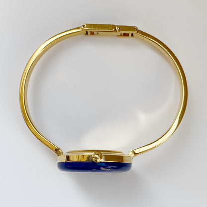 Gucci 1990s Interchangeable Bezel Gold Plated Bangle Watch with 12 bezels, case