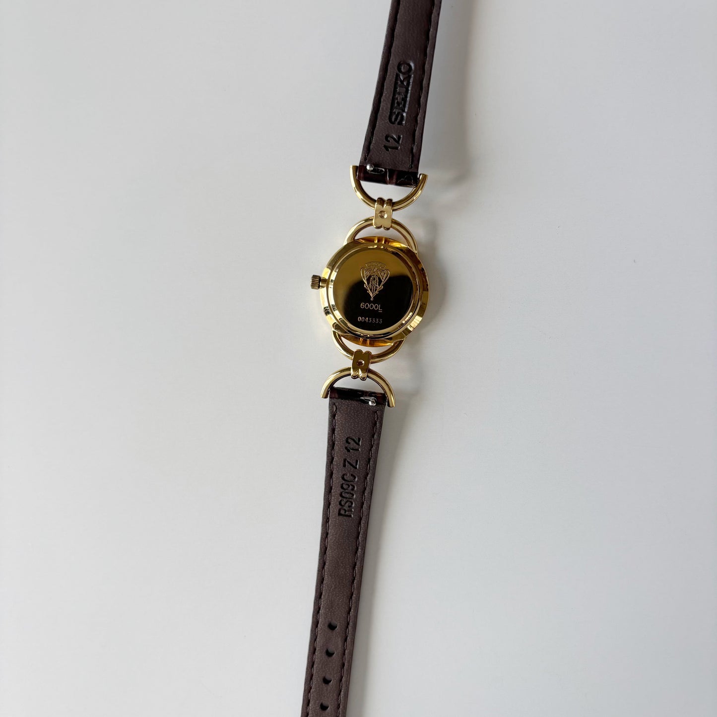 Gucci 1990s Round Dial Horsebit Gold Plated Watch