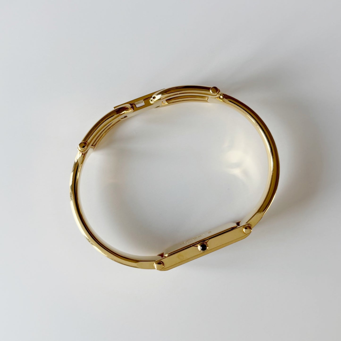 Gucci 1990s Black Dial Gold Plated Bangle Watch
