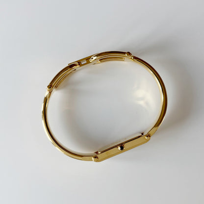 Gucci 1990s Black Dial Gold Plated Bangle Watch