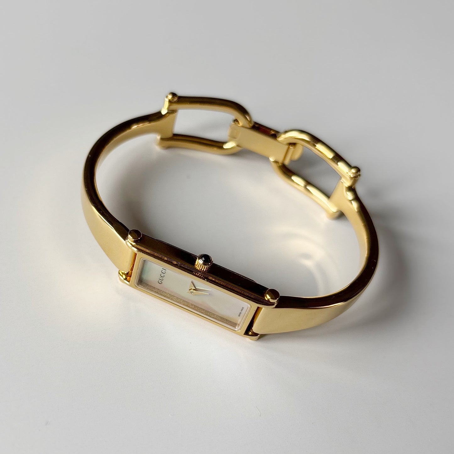 Gucci 1990s Seashell Rectangular Dial Gold Plated Bangle Watch