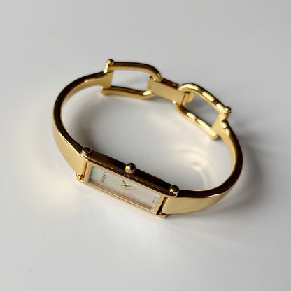 Gucci 1990s Seashell Rectangular Dial Gold Plated Bangle Watch
