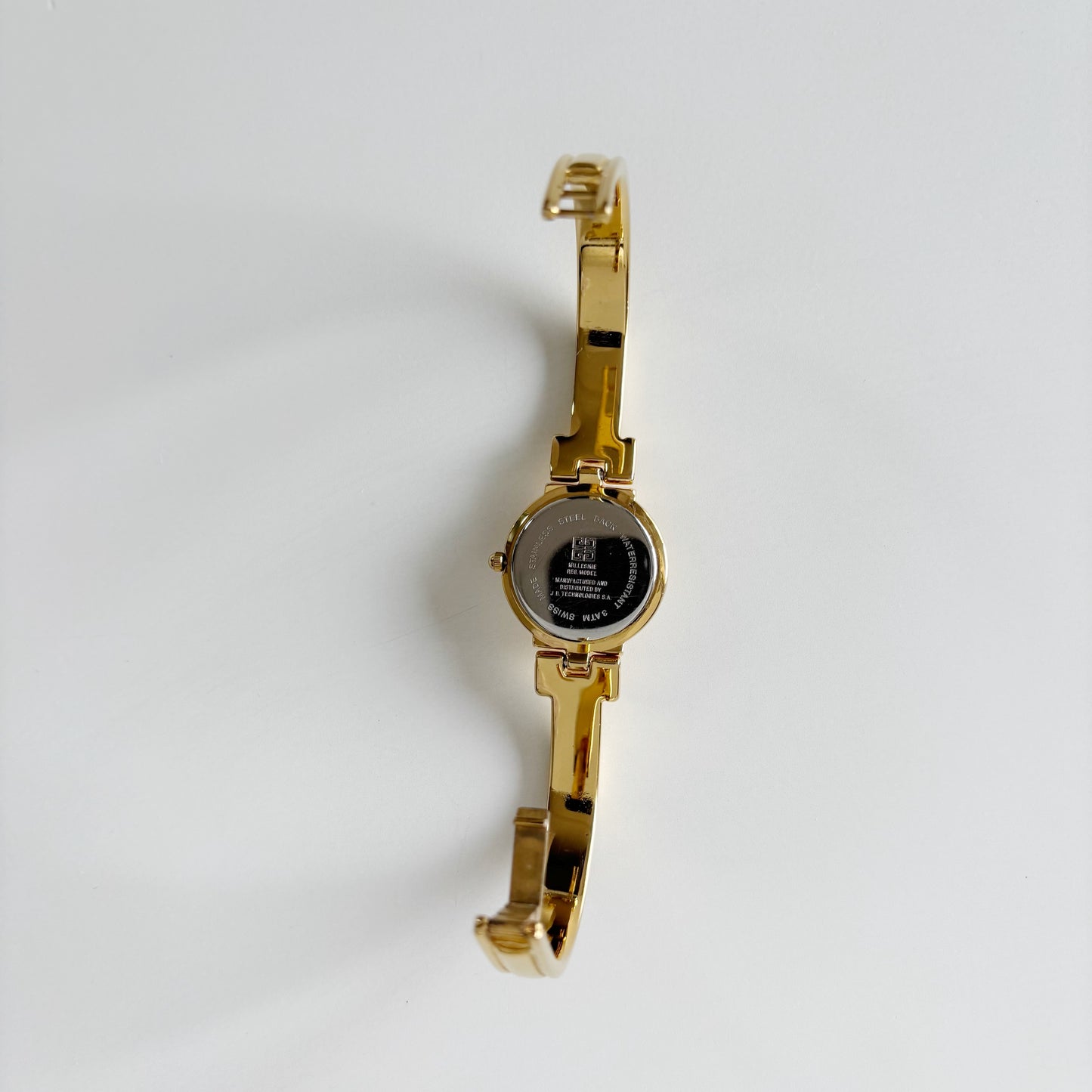 Givenchy 1990s Round Dial Gold Plated Bangle Watch