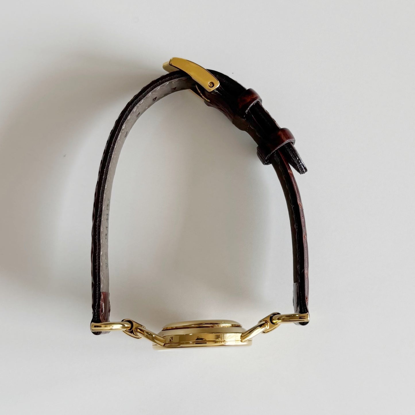 Gucci 1990s Round Dial Gold Plated Horsebit Watch