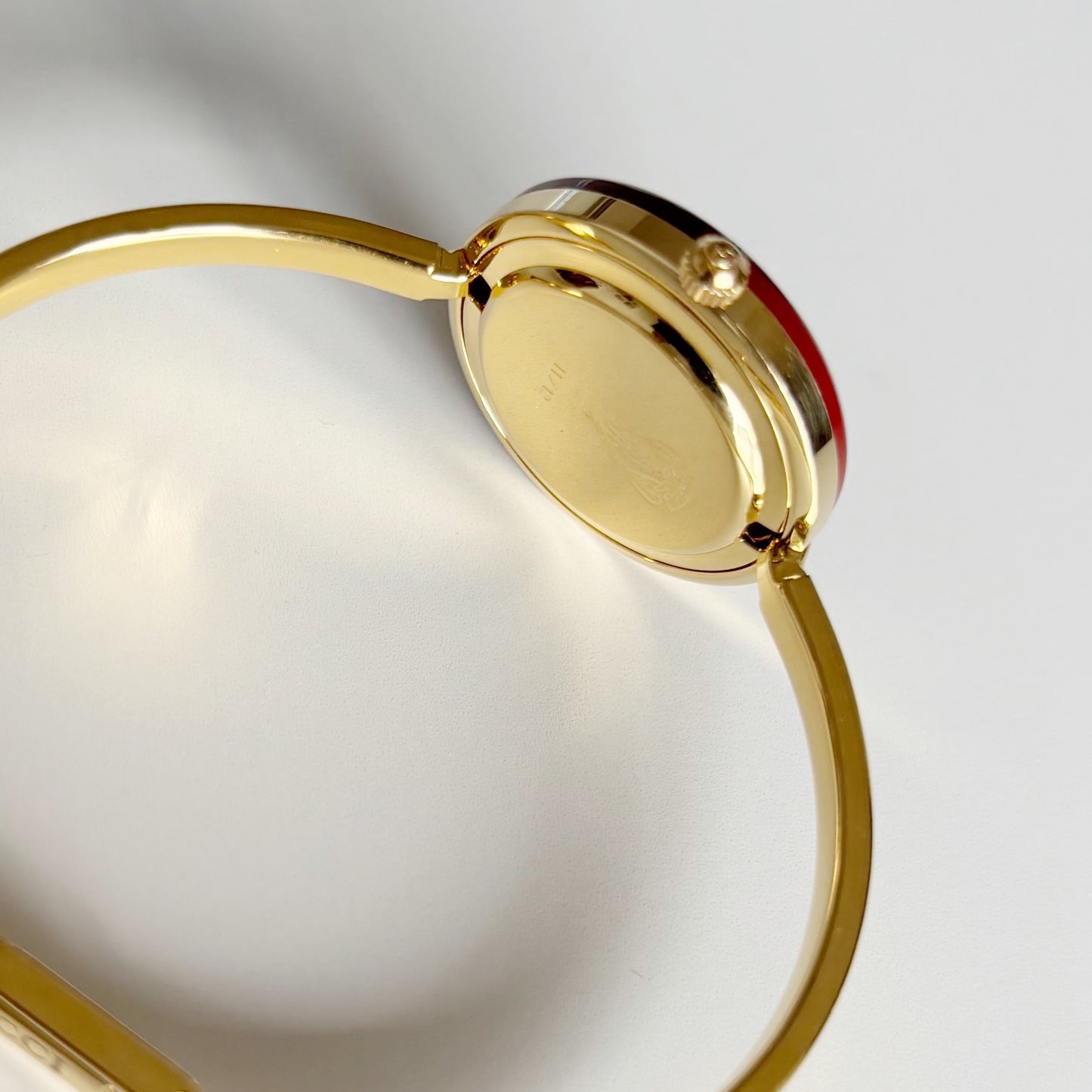 Gucci 1990s Interchangeable Bezel Gold Plated Bangle Watch with 12 bezels, case