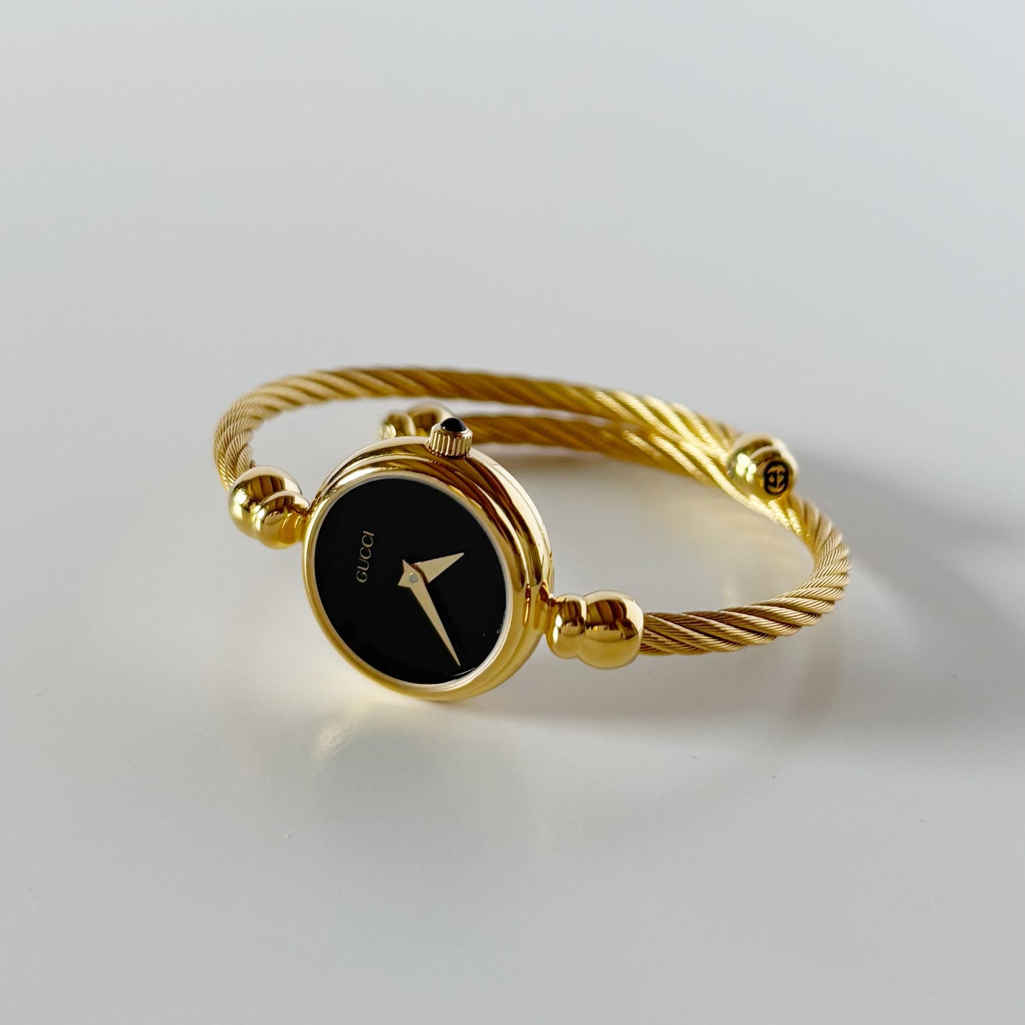 Gucci 1990s Black Dial Gold Plated Cable Band Bangle Watch