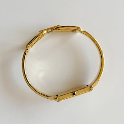 Gucci 1990s Seashell Dial Rectangular Gold Plated Bangle Watch