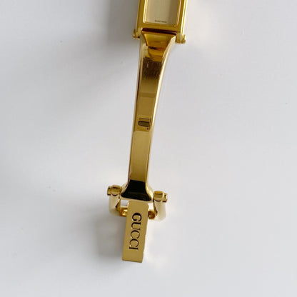 Gucci 1990s Gold Dial Rectangular  Gold Plated Bangle Watch