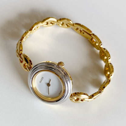Gucci 1990s Interchangeable Bezel Gold Plated Watch with 6 bezels, case (165m)