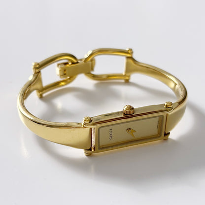 Gucci 1990s Gold Dial Gold Plated Bangle Watch