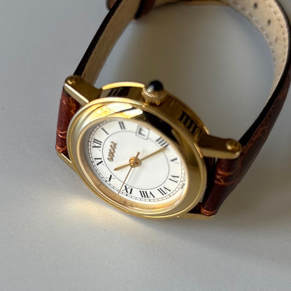 Gucci 1990s Date Round Dial Gold-Plated Watch