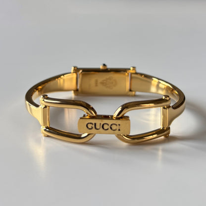Gucci 1990s Black Rectangular Dial Gold Plated Bangle Watch