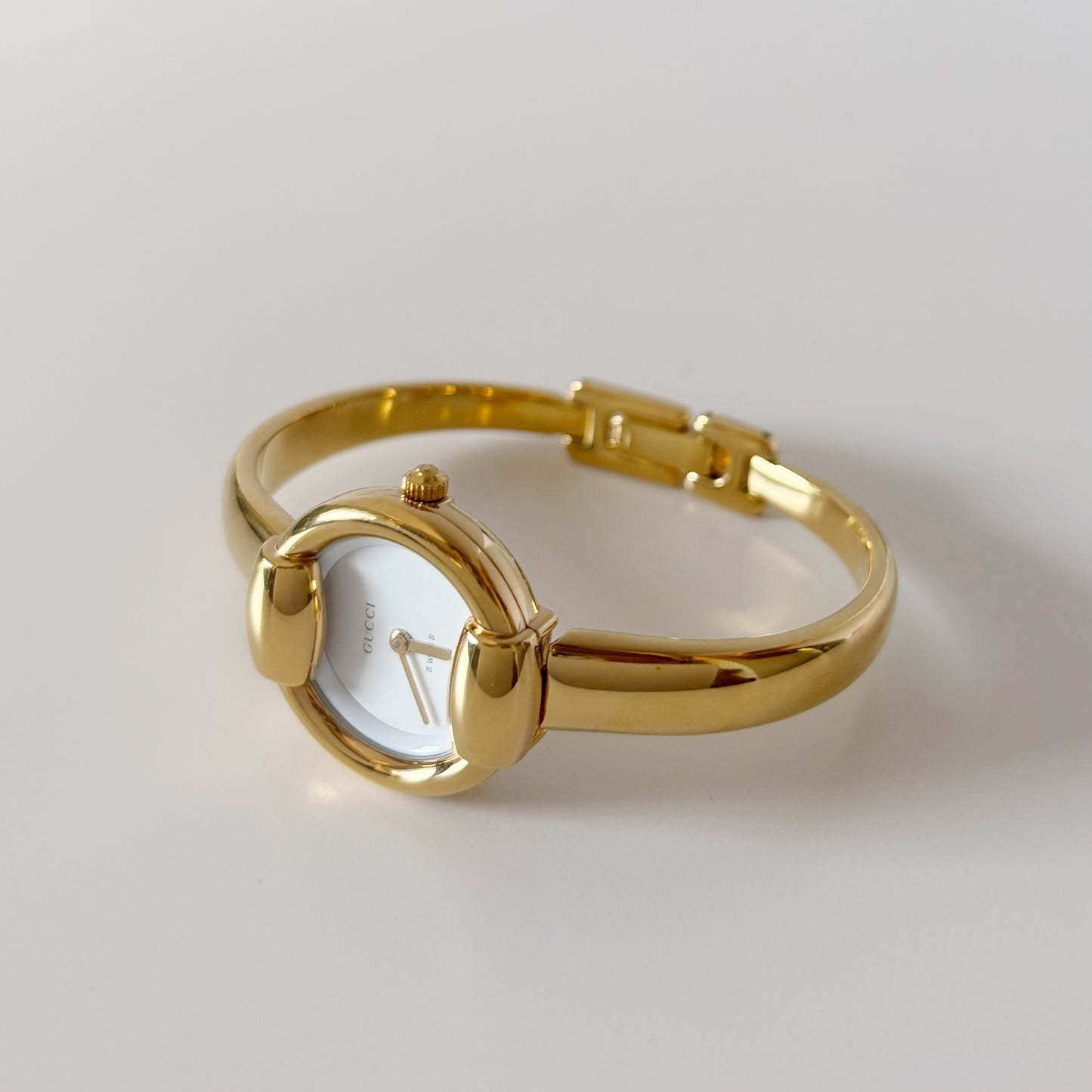 Gucci 1990s Round Dial Gold Plated Bangle Watch