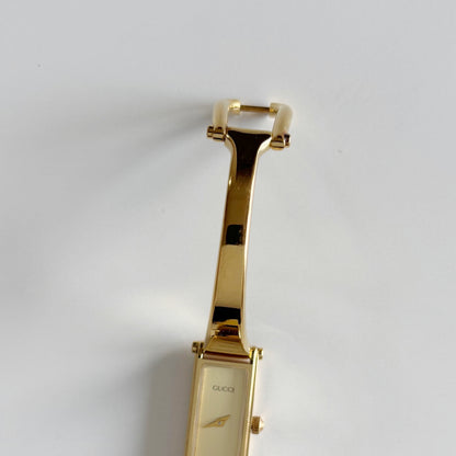 Gucci 1990s Gold Dial Rectangular Gold Plated Bangle Watch