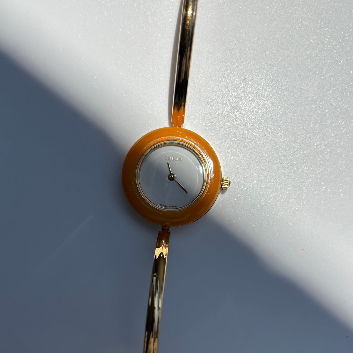 Gucci 1990s Interchangeable Bezel Gold Plated Bangle Watch with 12 bezels, case