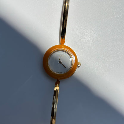 Gucci 1990s Interchangeable Bezel Gold Plated Bangle Watch with 12 bezels, case