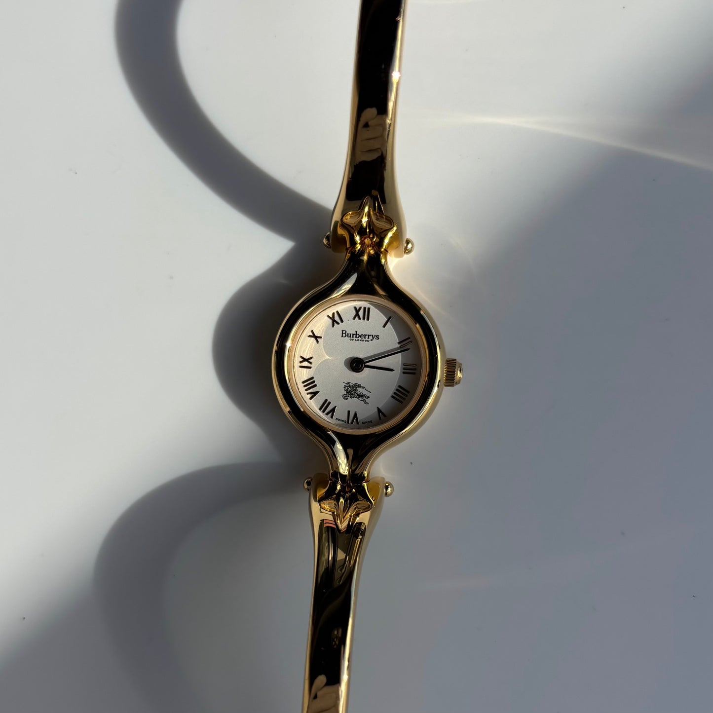 Burberry 1990s Round Dial Gold Plated Bangle Watch