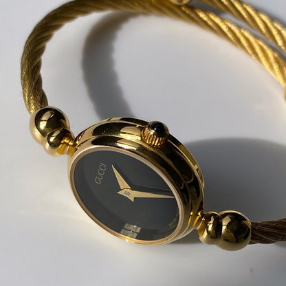 Gucci 1990s Black Dial Gold Plated Bangle Watch