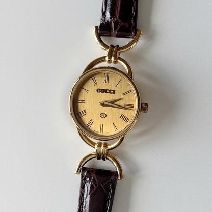 Gucci 1990s Round Dial Horsebit Gold Plated Watch