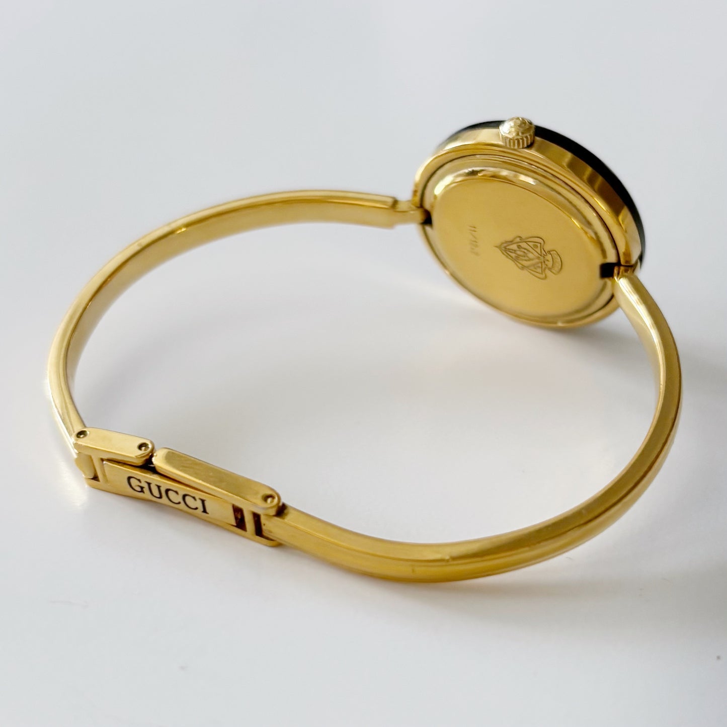 Gucci 1990s Interchangeable Bezel Gold Plated Bangle Watch with 12 bezels, case