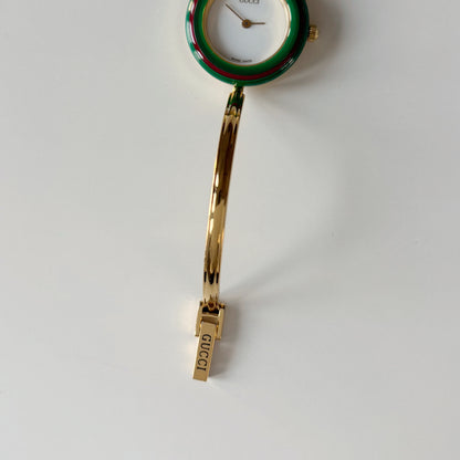 Gucci 1990s Interchangeable Bezel Gold Plated Bangle Watch with 12 bezels, case