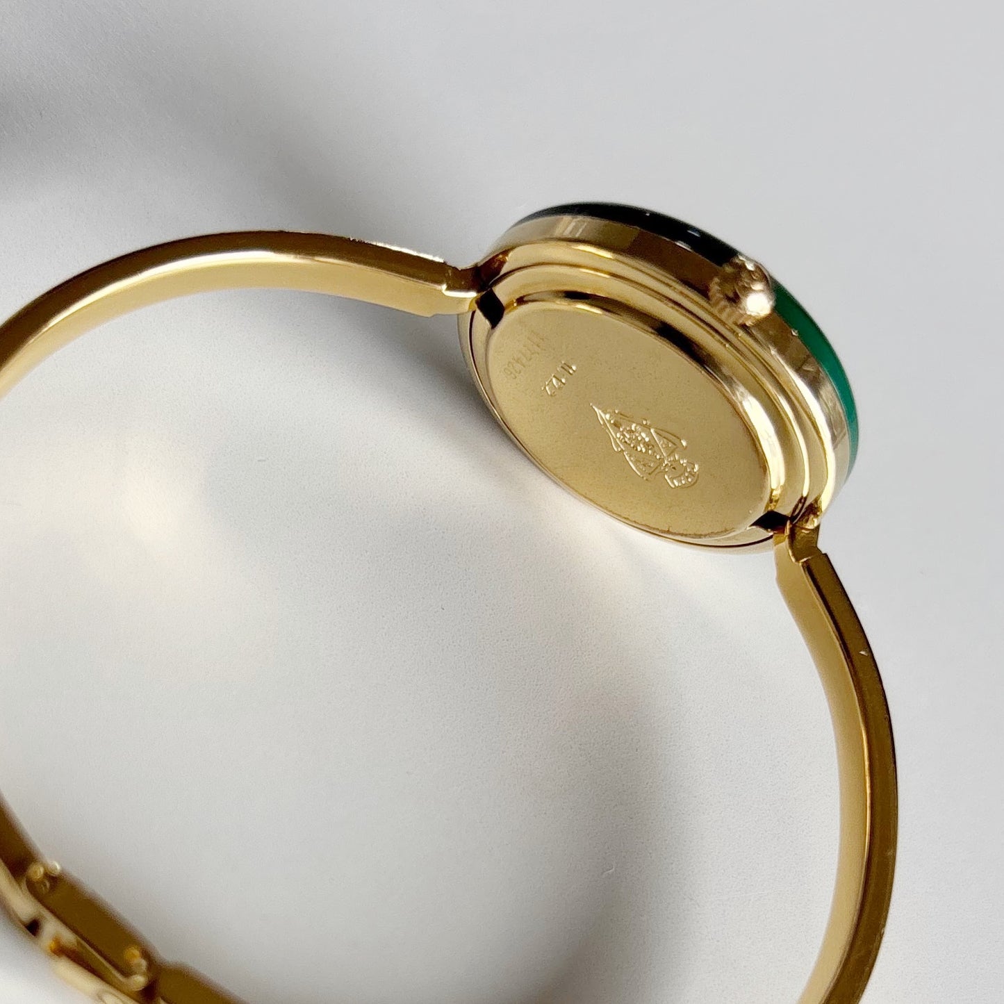 Gucci 1990s Interchangeable Bezel Gold Plated Bangle Watch with 12 bezels, case