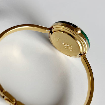 Gucci 1990s Interchangeable Bezel Gold Plated Bangle Watch with 12 bezels, case