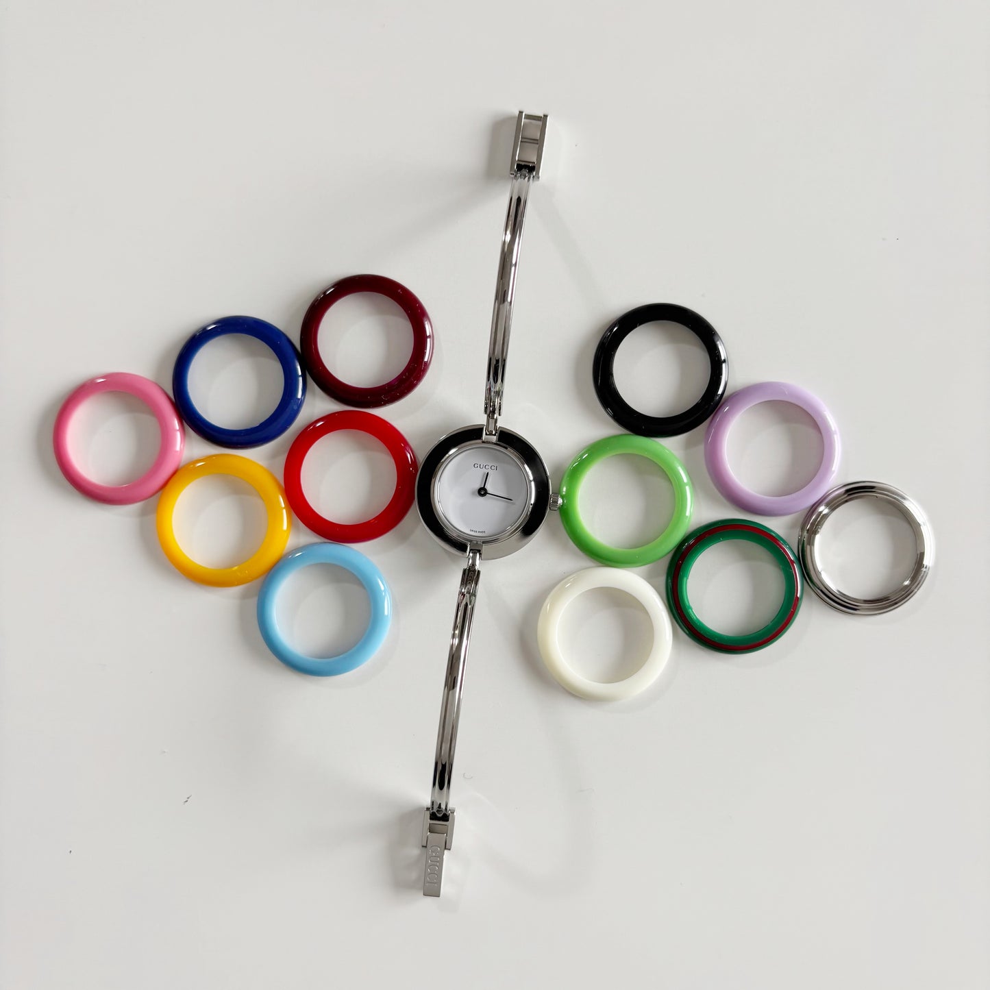 Gucci 1990s Interchangeable Bezel Stainless steel Bangle Watch with 12 bezels, case