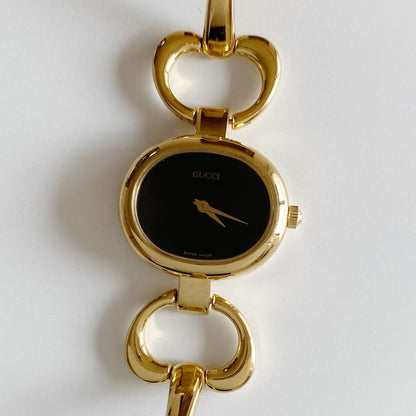 Gucci 1990s Black Dial Gold Plated Bangle Watch