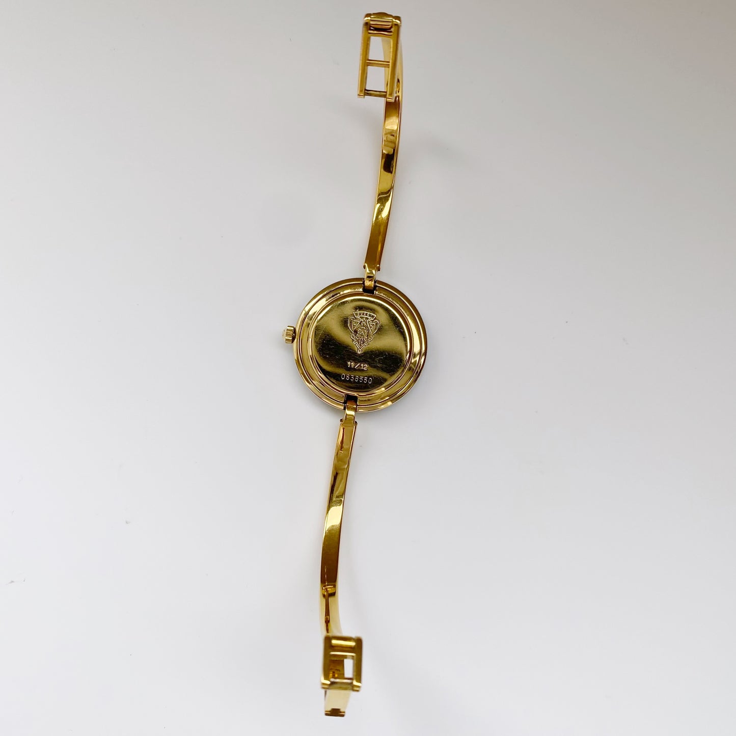 Gucci 1990s Interchangeable Bezel Gold Plated Bangle Watch with 12 bezels, case