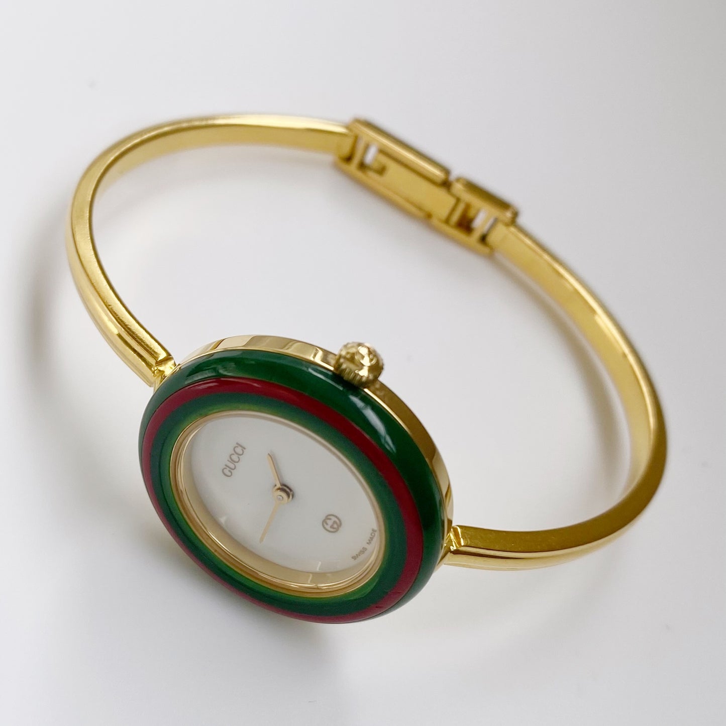 Gucci 1990s Interchangeable Bezel Gold Plated Bangle Watch with 12 bezels, case