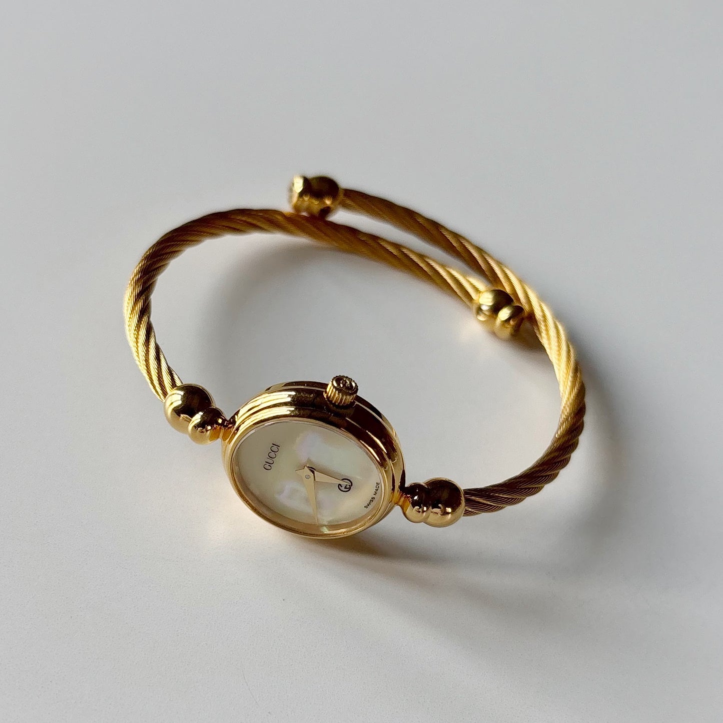 Gucci 1990s Seashell Dial Gold Plated Cable Bangle Watch